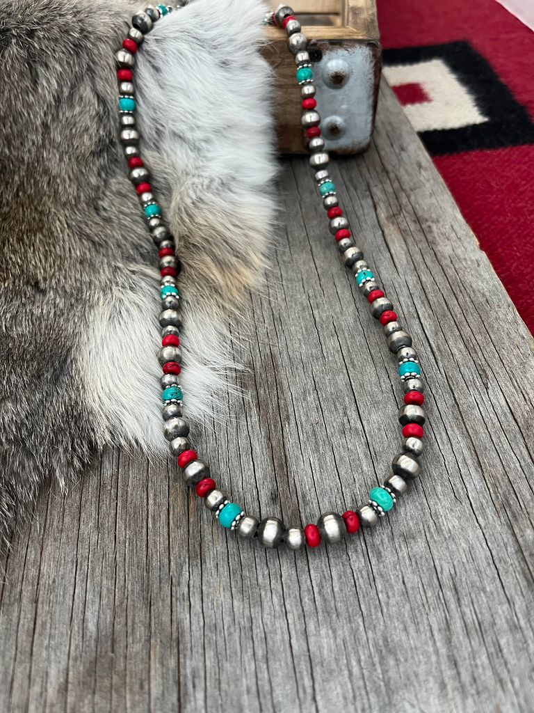 Navajo necklace. 2 strands of shell (heshe) beads and turquoise beads –  Objects – eMuseum